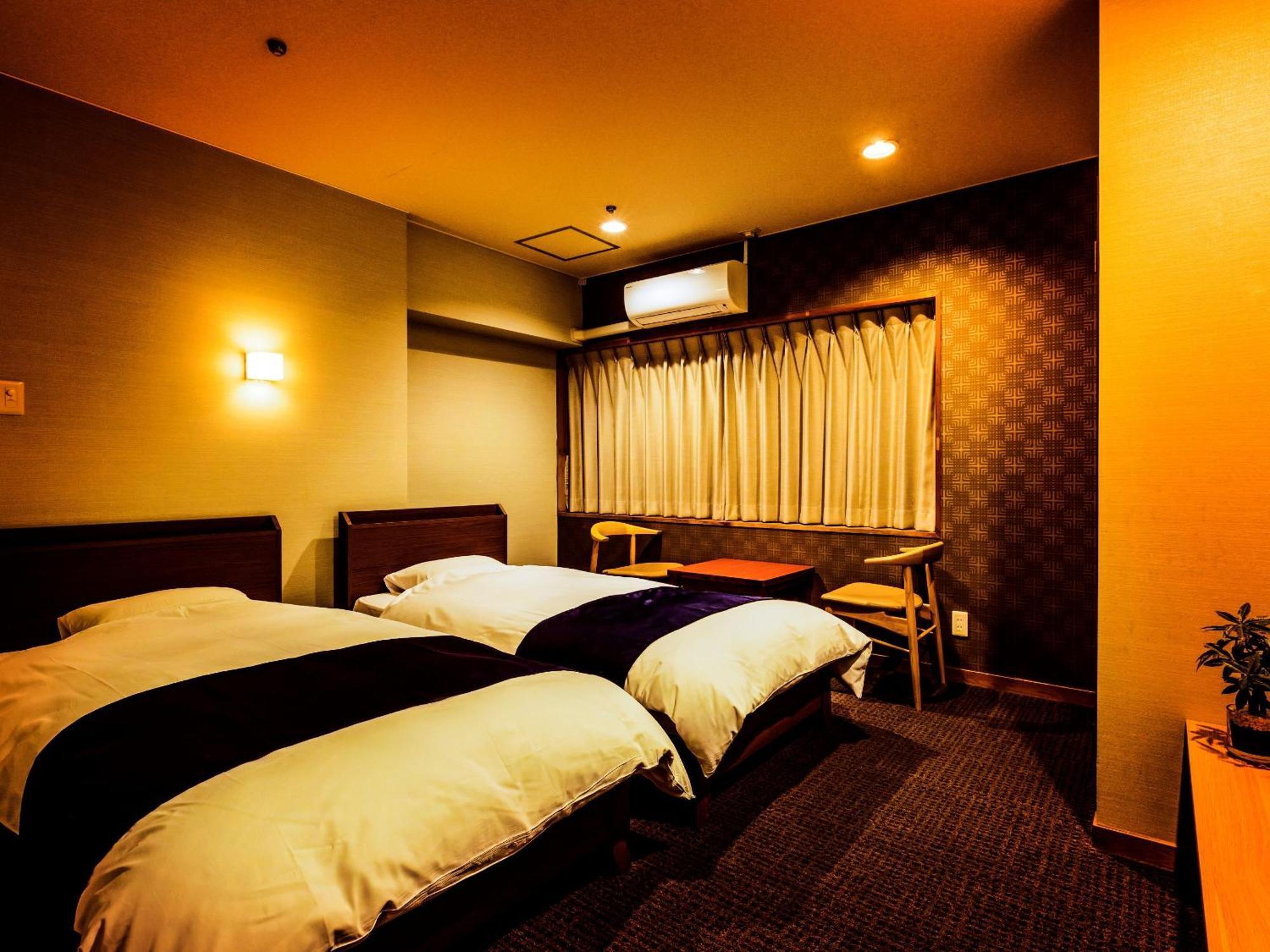 Hotel Ooedo Onsen Monogatari Premium Shirahama Gyoen Zimmer foto